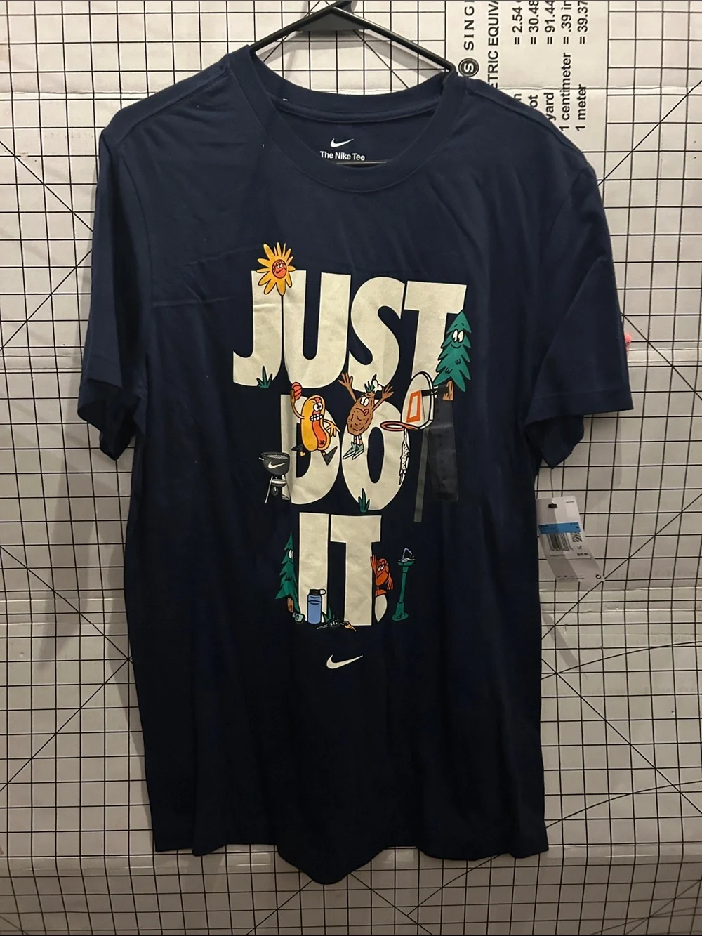 Nike Men’s Navy Graphic 'JUST DO IT' Tee with Multicolor Outdoor Icons